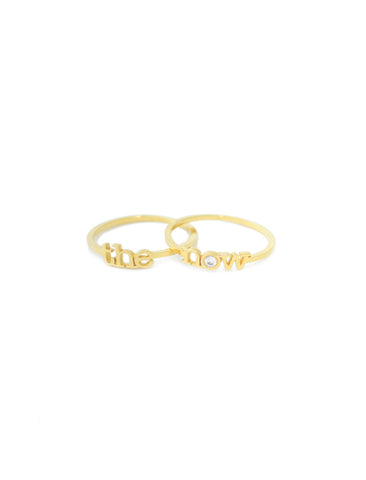 jewelry for this moment. the now.  The 14 karat gold ‘the now’ message in two stackable rings, anchored by a shining diamond, encourages you to let go of whatever holds you back and to live in this moment - the now.